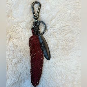 Coach feather bag charm